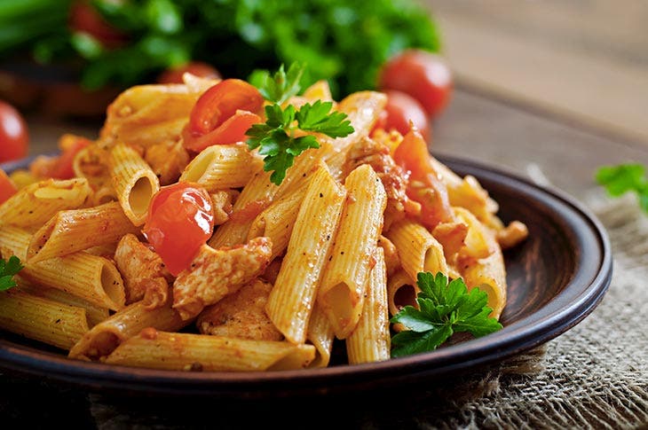 A pasta dish with sauce